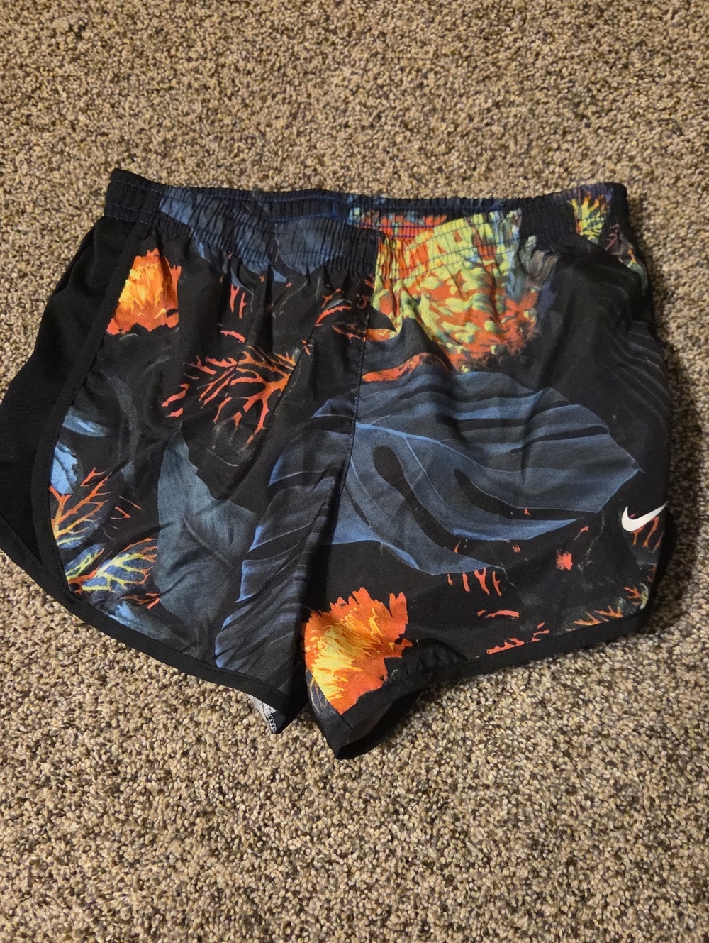 Nike Black Floral Print Athletic Shorts with Orange Accents